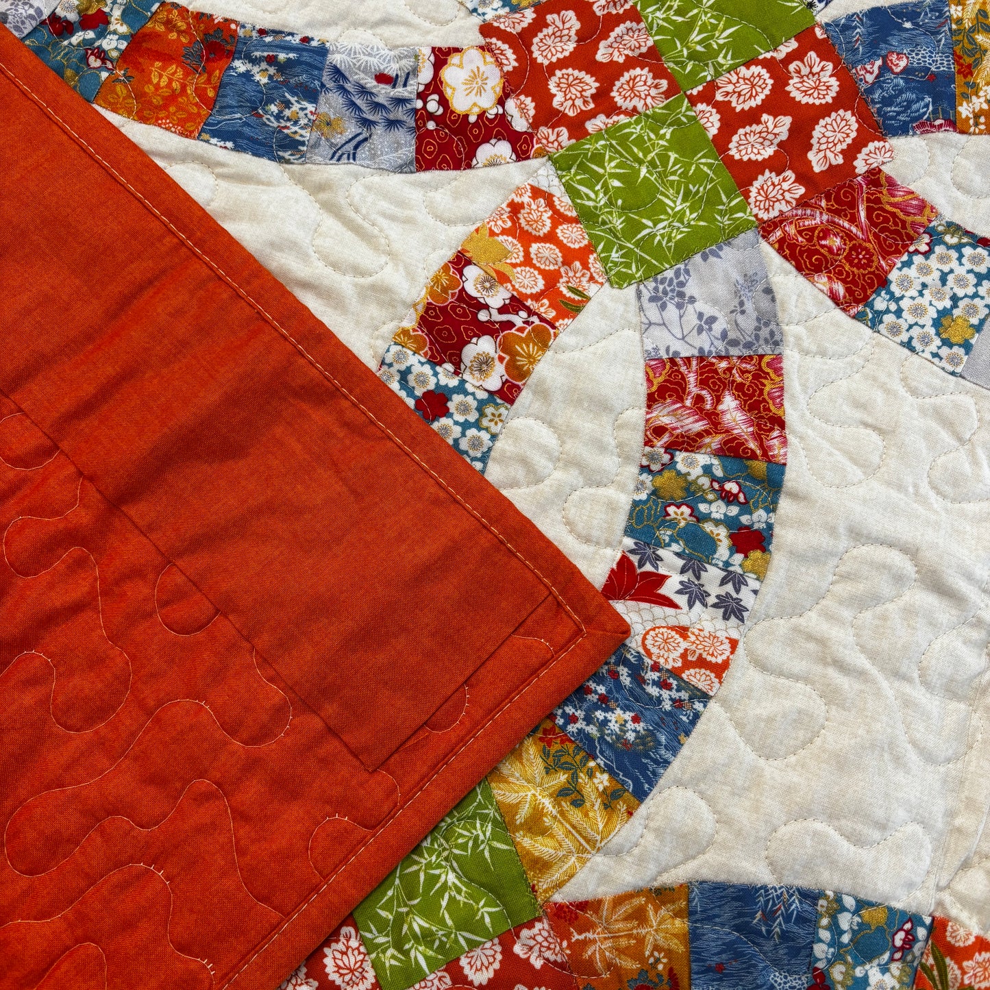 The Double Wedding Ring Quilt 58" square (Q72)