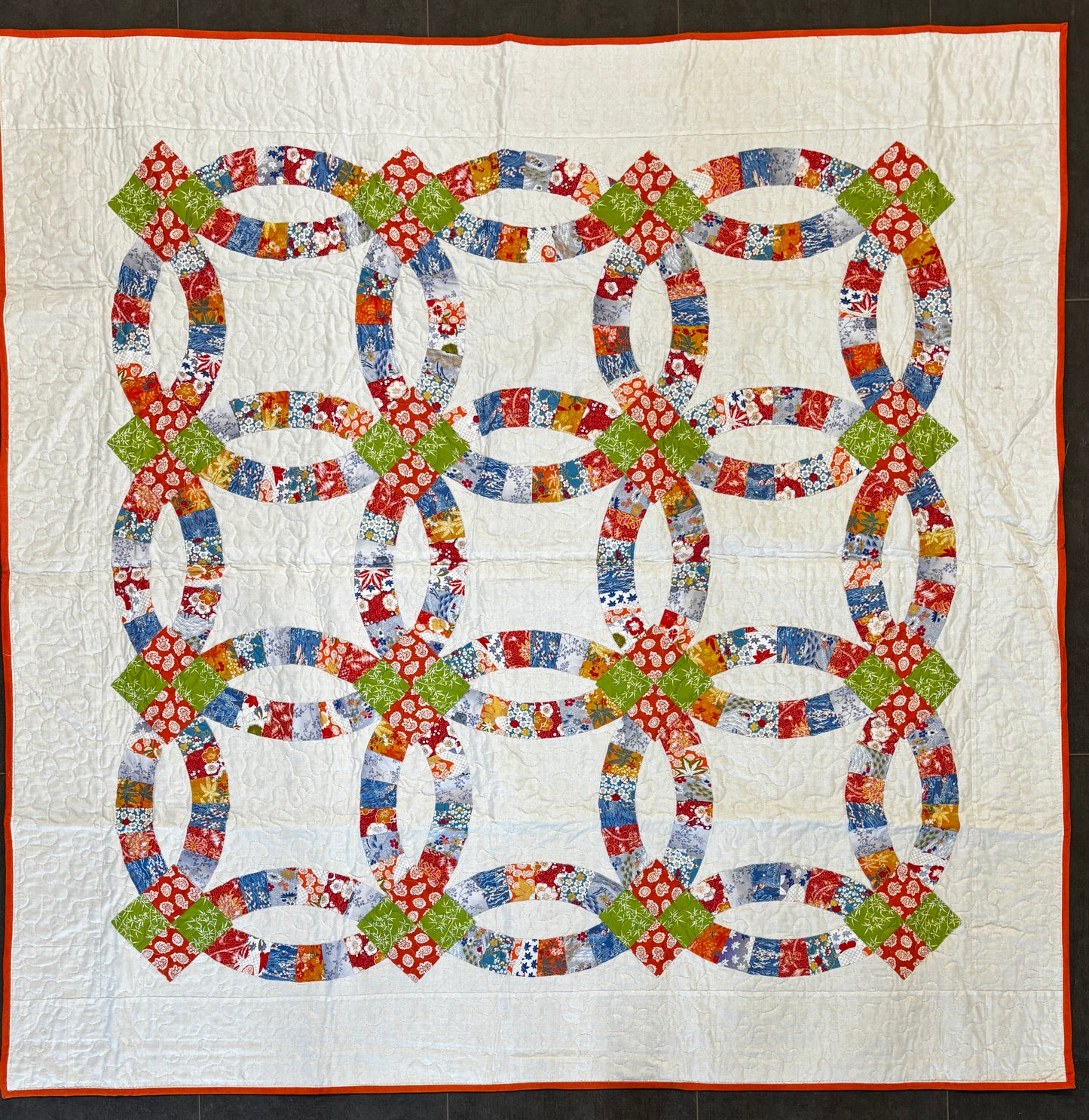 The Double Wedding Ring Quilt 58" square (Q72)