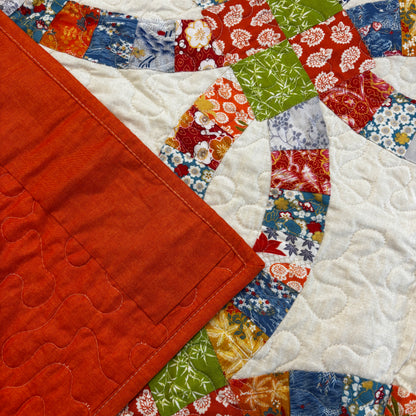 The Double Wedding Ring Quilt 58" square (Q72)